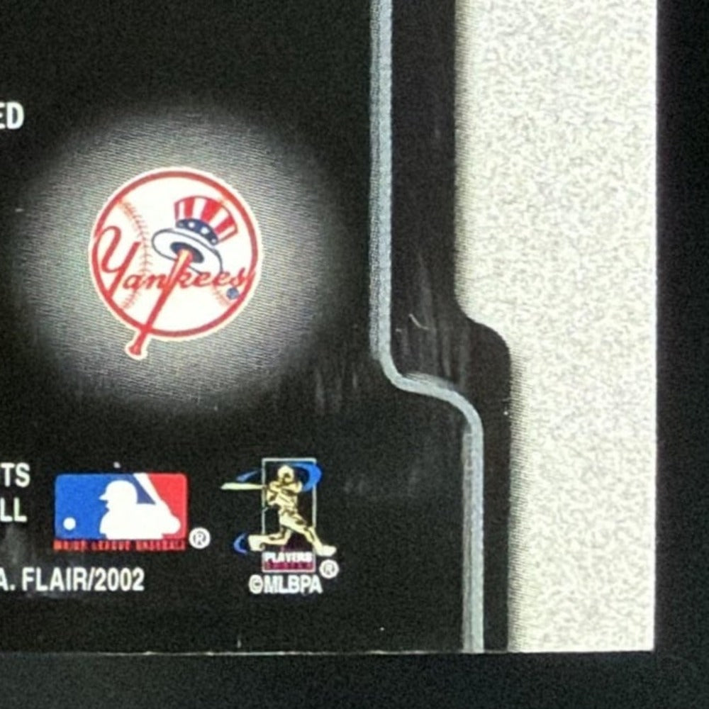 2002 Flair Power Tools Dual Bernie Williams / Derek Jeter Bat card - back bottom right corner close-up