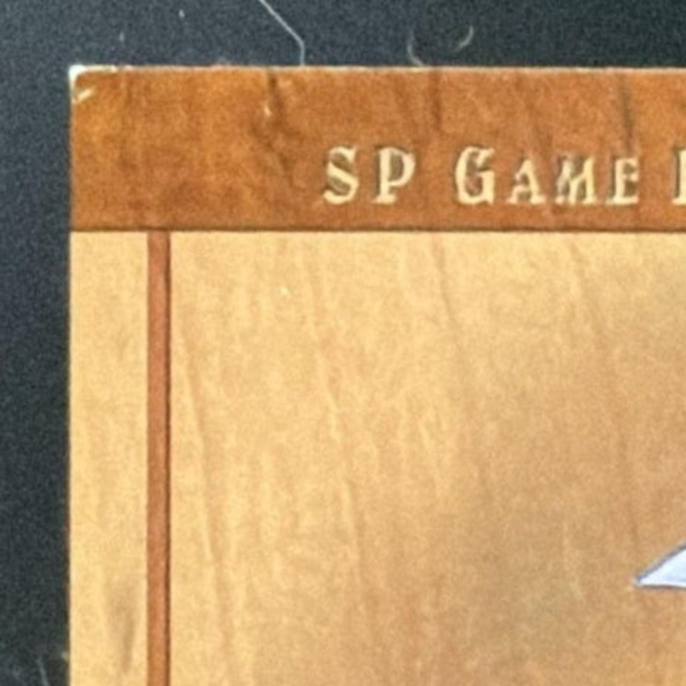 2001 SP Game Bat Milestone Piece of the Action Ken Griffey Jr. Bat card - front top left corner close-up
