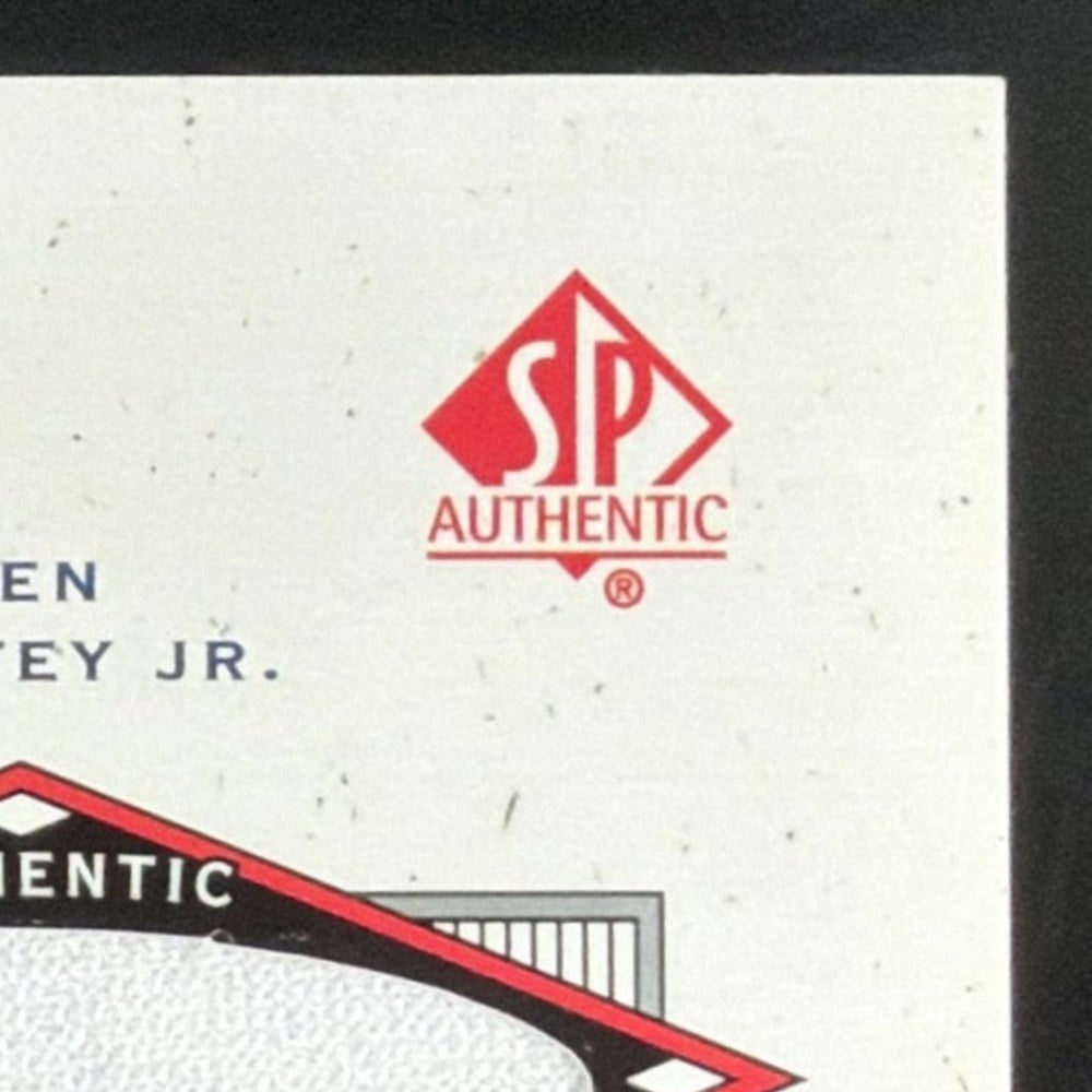 2001 SP Authentic UD Exclusives Ken Griffey Jr. Jersey /243 card - front top right corner close-up