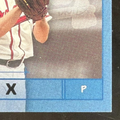 2001 Absolute Memorabilia Tools of the Trade Greg Maddux Patch /300 card - front bottom right corner close-up