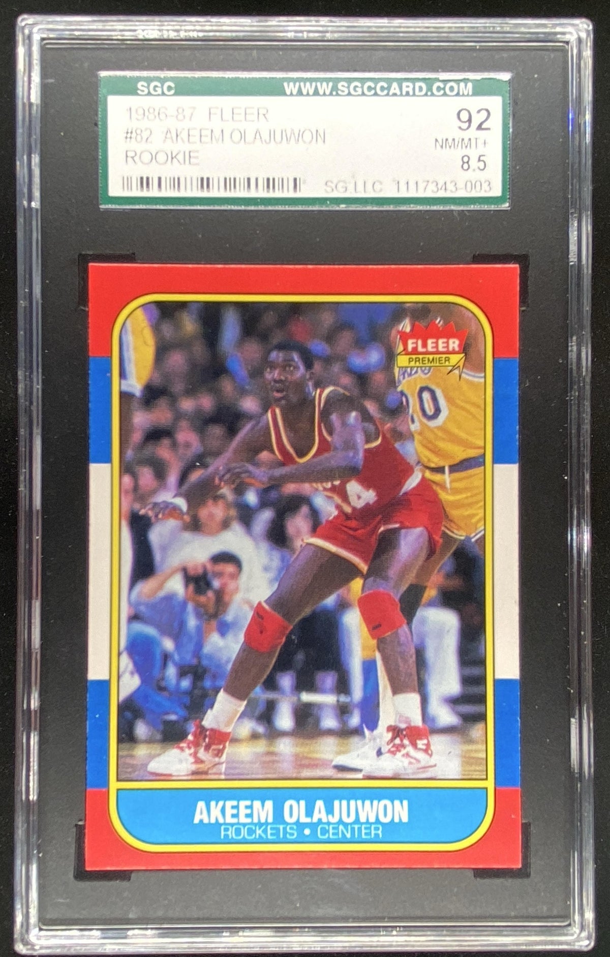 1986 Fleer Akeem Olajuwon #82 graded SGC 8.5 trading card