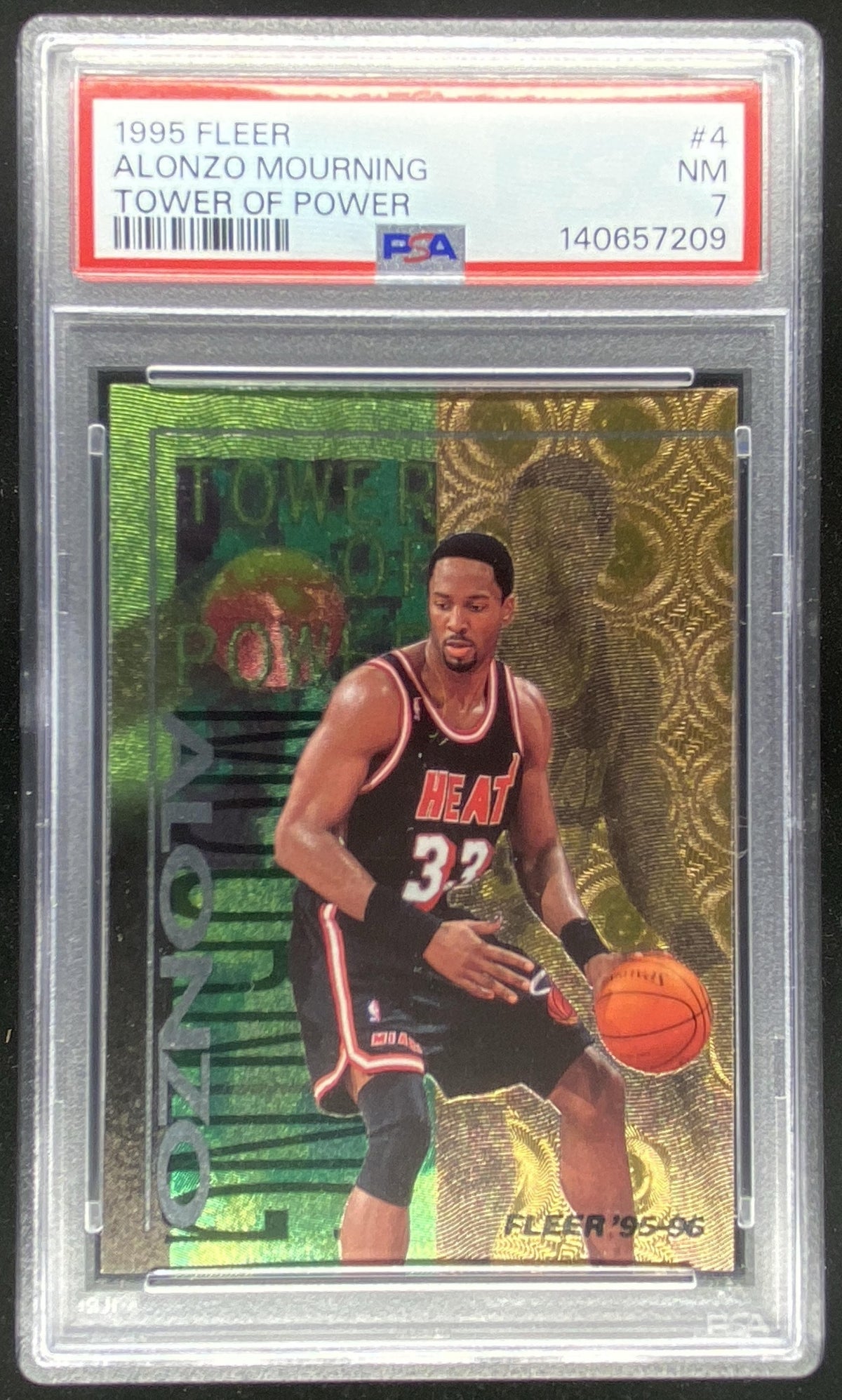1995 Fleer Alonzo Mourning #4 graded PSA 7 trading card