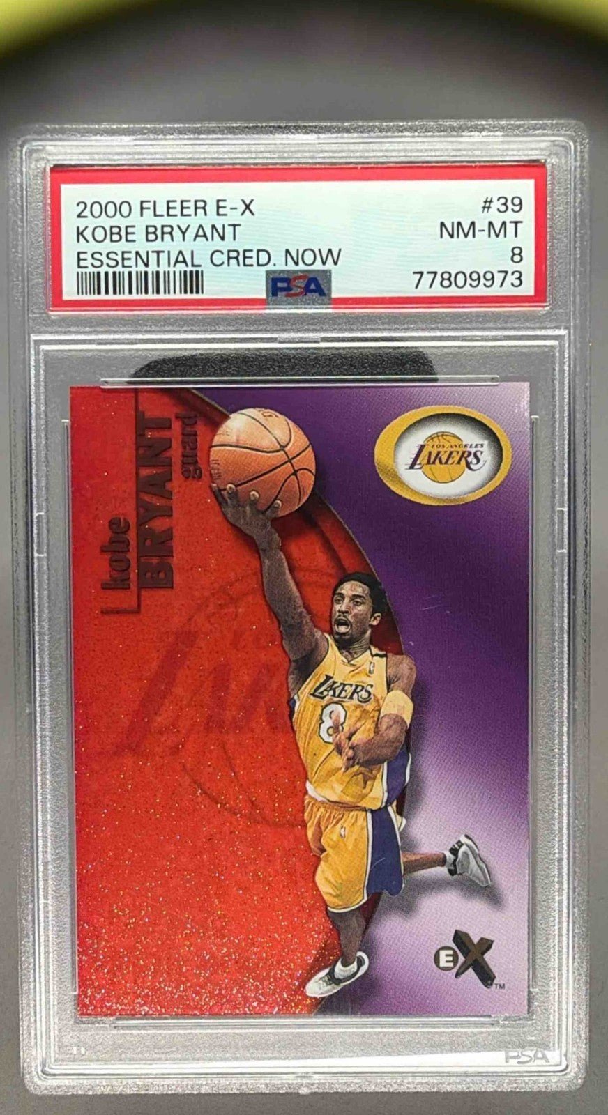 KOBE BRYANT 2000 FLEER E - X ESSENTIAL CREDENTIALS /201 PSA 8 - LAKERS - Columbia Hobby - Sports Card Boxes - Toploaders - Card Savers